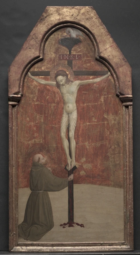 Saint François d’Assise : François agenouillé devant le Christ en croix, panneau de Sassetta.