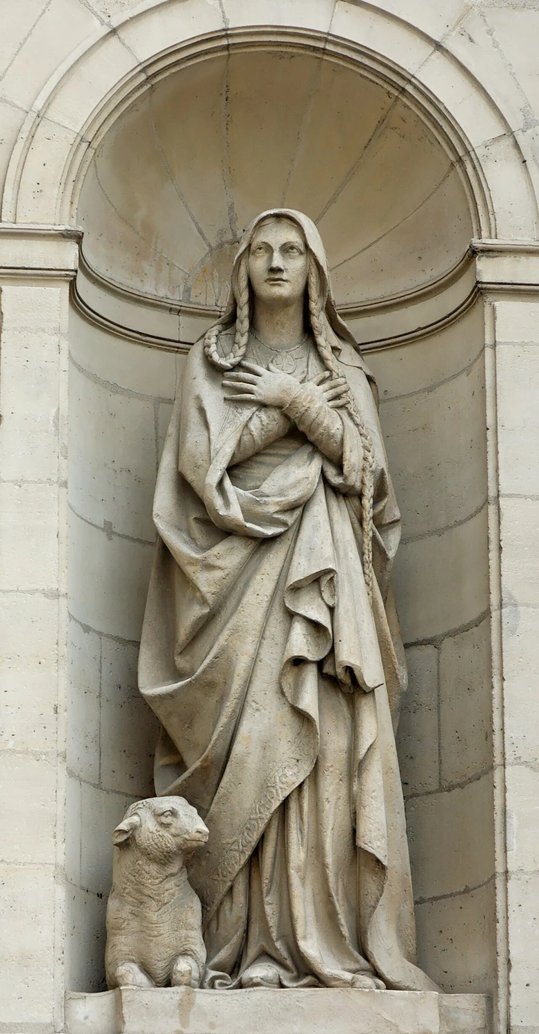 Sainte Geneviève : Statue de Geneviève tenant un cierge, avec un agneau à ses pieds, à Saint-Étienne-du-Mont.